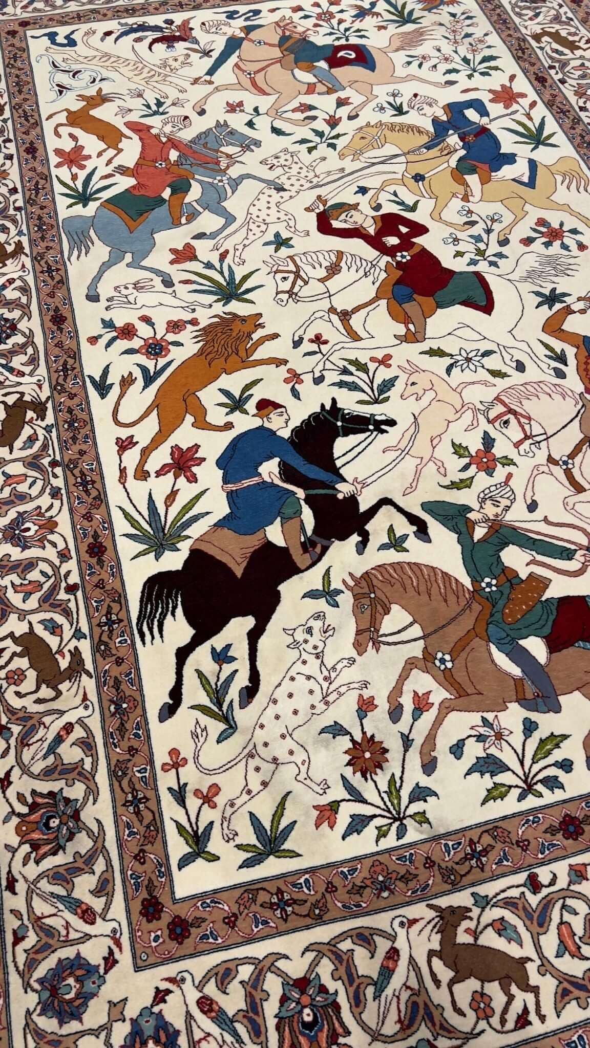 Collectible Persian hunting rug handwoven by the late Ahmad Seirafian.